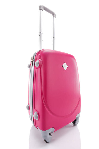 bright red wheeled colorful suitcase with handle isolated on white