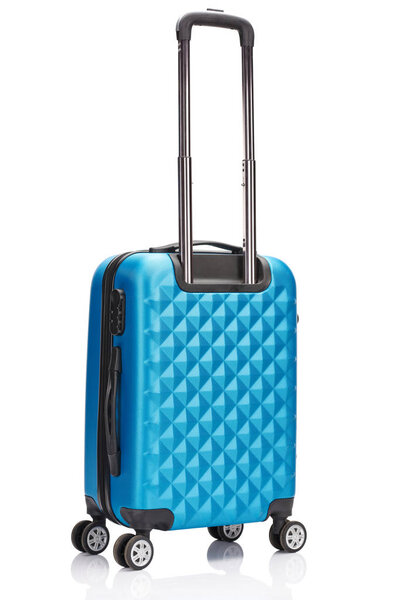 blue wheeled suitcase with handle isolated on white