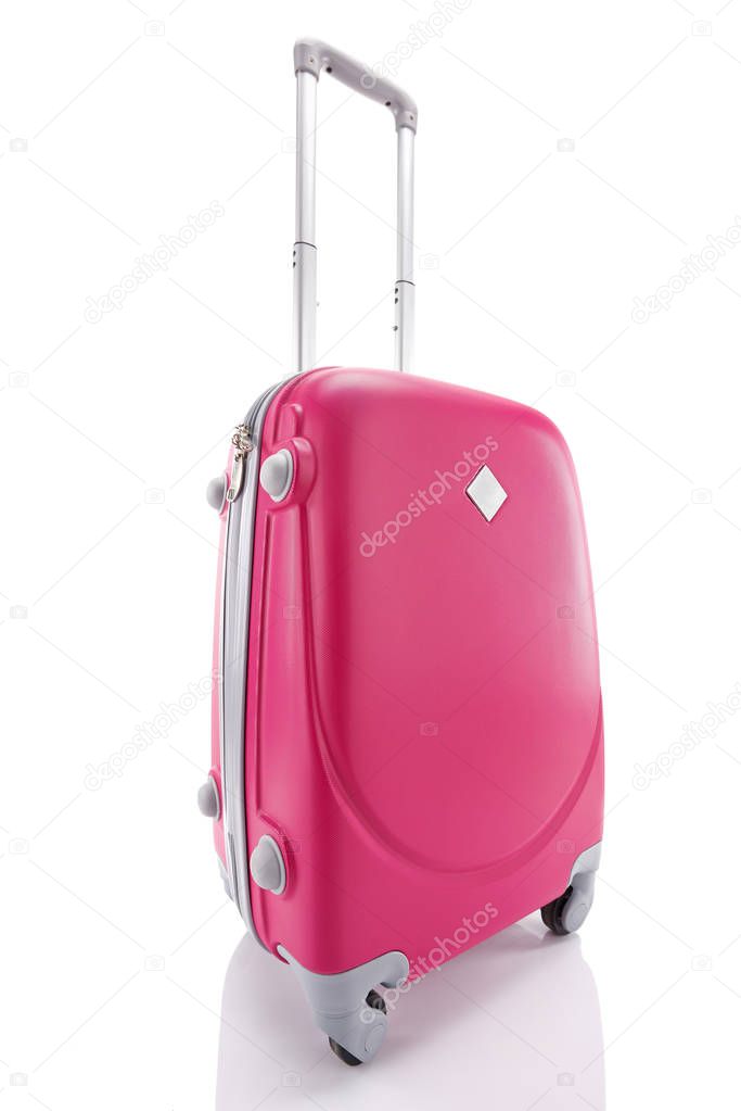 bright red wheeled colorful suitcase with handle isolated on white