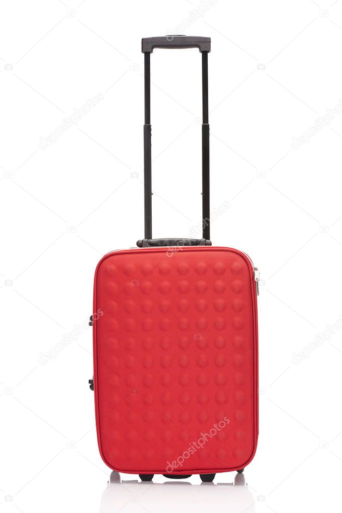 red colorful suitcase with handle on wheels isolated on white