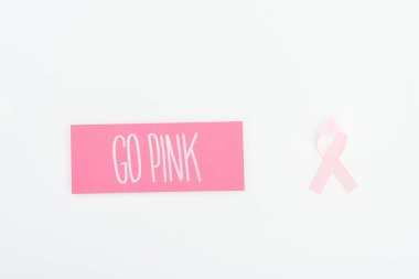 top view of pink breast cancer sign and card with go pink lettering on white background clipart