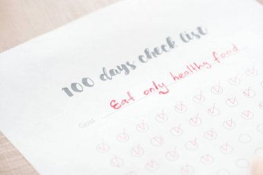 selective focus of 100 days check list clipart