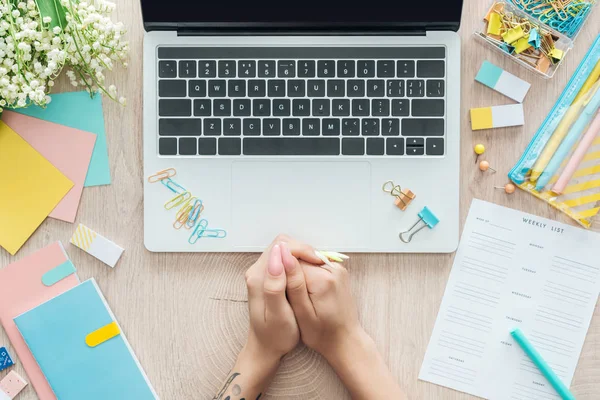 Cropped View Woman Sitting Wooden Table Laptop Flowers Stationery — Stock Photo, Image