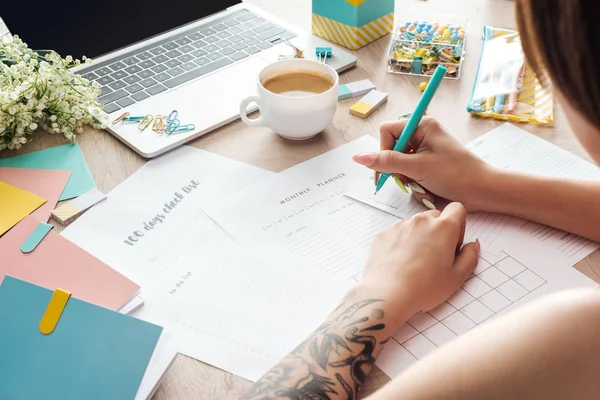 Cropped View Woman Sitting Wooden Table Laptop Stationery Writing Paper — Stock Photo, Image