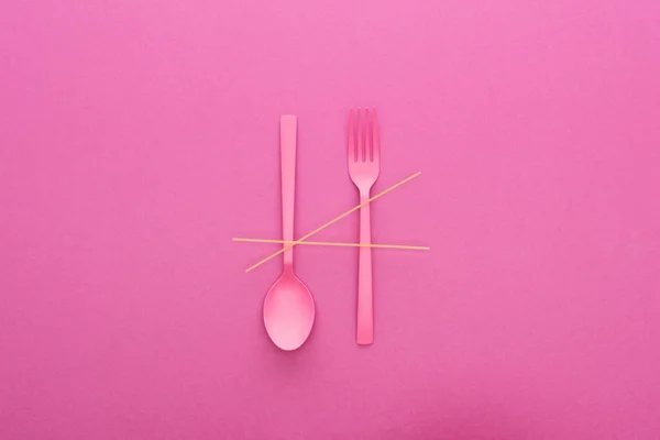 Pink Plastic Spoon Upside Fork Spaghetti Isolated Pink — Stock Photo, Image