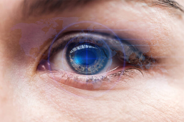 close up view of human eye with data illustration, robotic concept
