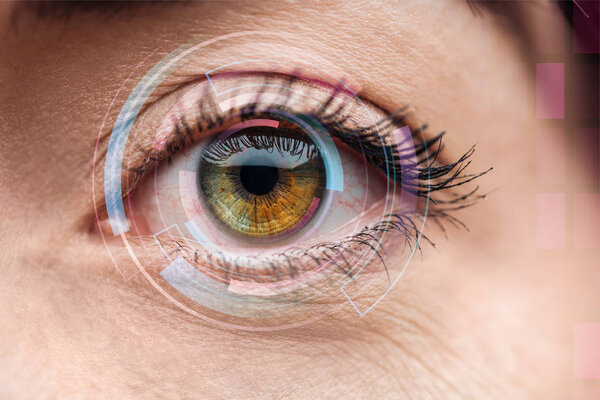 close up view of human colorful eye with data illustration, robotic concept