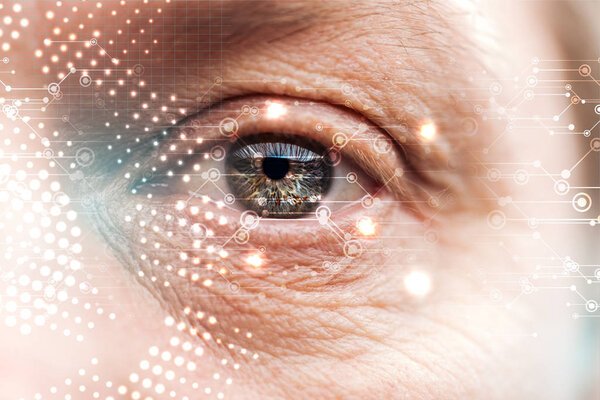 close up view of human eye with wrinkles and data illustration, robotic concept