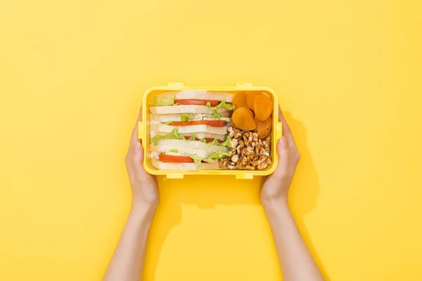 Cropped View Woman Holding Lunch Box Nuts Dried Apricots Sandwiches — Stock Photo, Image