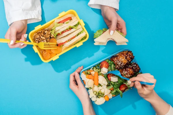 Cropped View Two Women Holding Forks Lunch Boxes Food — Stock Photo, Image