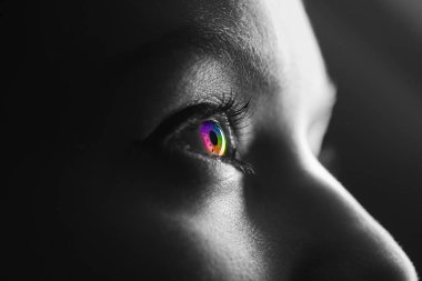 black and white shot of human with colorful rainbow eye clipart