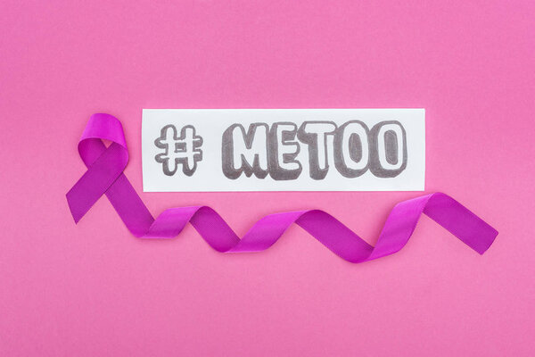 top view of long purple awareness ribbon near paper with hashtag me too isolated on pink