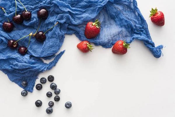 Top View Sweet Blueberries Cherries Whole Strawberries Blue Cloth — Stock Photo, Image