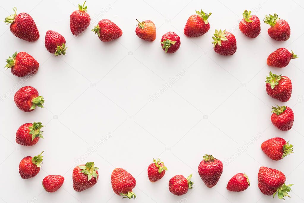 top view of sweet and fresh strawberries on white background 