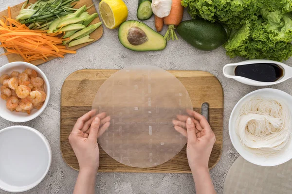 Top View Woman Putting Rice Paper Cutting Board — Stock Photo, Image