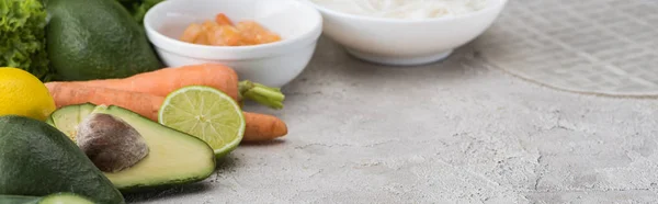 Panoramic Shot Lime Avocados Carrots Shrimps Rice Paper Noodles Table — Stock Photo, Image