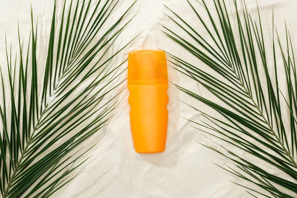 Top View Palm Leaves Orange Sunscreen Sand — Stock Photo, Image