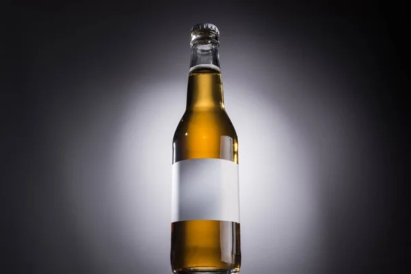 Low Angle View Glass Bottle Beer White Label Dark Background — Stock Photo, Image