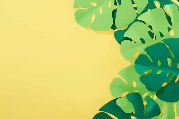 Top View Paper Cut Green Tropical Leaves Yellow Bright Background — Stok Foto