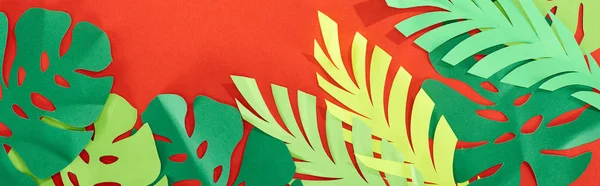 Top View Green Paper Cut Tropical Leaves Bright Red Background — Stock Photo, Image