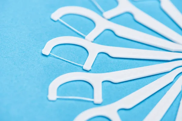 Selective Focus White Floss Sticks Isolated Blue — Stock Photo, Image