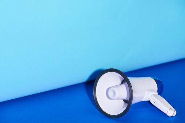 loudspeaker on bright and colorful background with copy space 