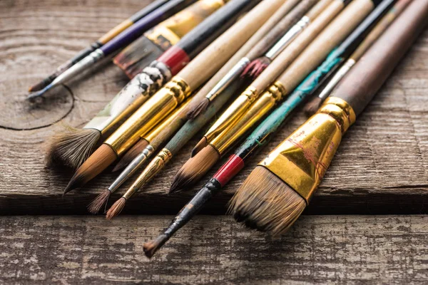 Close View Old Paintbrushes Wooden Brown Surface — Stock Photo, Image