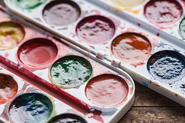 Close View Watercolor Paint Palettes Wooden Table — Stock Photo, Image