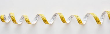 panoramic shot of colorful measuring tape on white background  clipart
