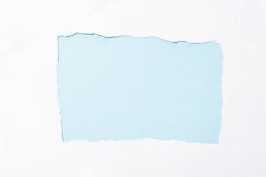 light blue colorful background in white torn paper hole clipart