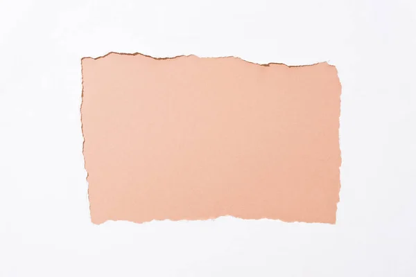 Beyaz Yırtık Kağıt Delik Bej Renkli Arka Plan — Stok fotoğraf