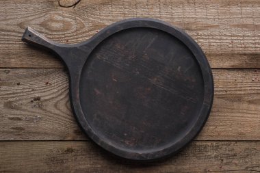 dokulu masa üzerinde boş ahşap pizza tava üst görünümü