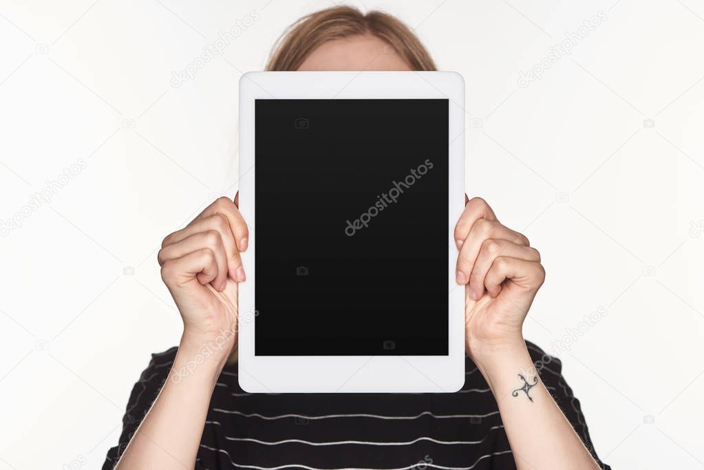 victim of cyberbullying holding digital tablet with blank screen isolated on white