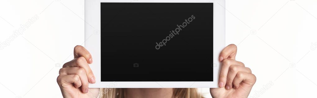 panoramic shot of victim of cyberbullying holding digital tablet with blank screen isolated on white