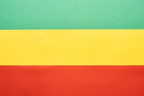 top view of colorful green, yellow and red Rastafarian flag 
