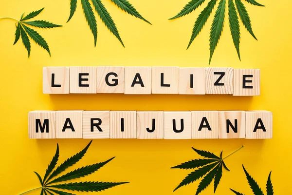 Top View Cannabis Leaves Wooden Blocks Legalize Marijuana Words Yellow — Stock Photo, Image