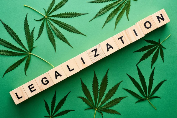 Top View Green Cannabis Leaves Legalization Word Wooden Blocks Green — Stock Photo, Image