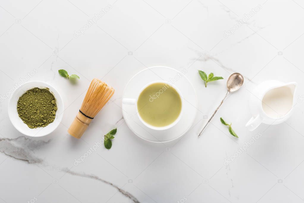 flat lay with green matcha tea on white table