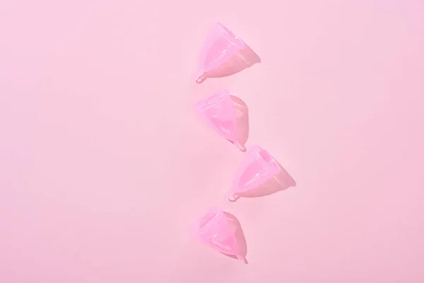 Top View Pink Plastic Menstrual Cups Pink Background — Stock Photo, Image