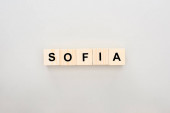 top view of wooden blocks with Sofia lettering on white background