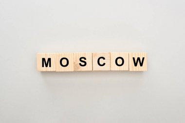 top view of wooden blocks with Moscow lettering on white background