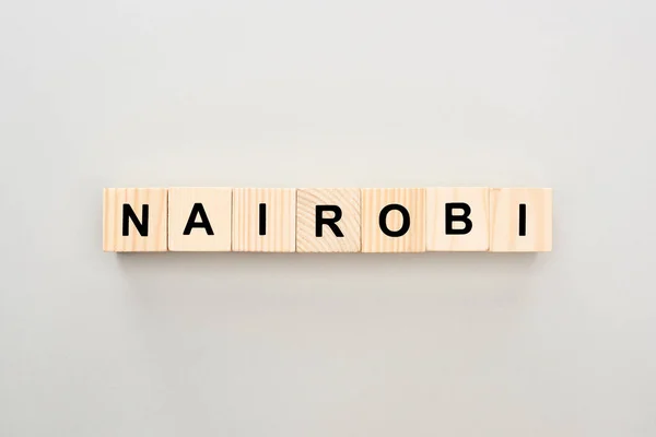 Widok Góry Drewniane Bloki Nairobi Napis Białym Tle — Zdjęcie stockowe