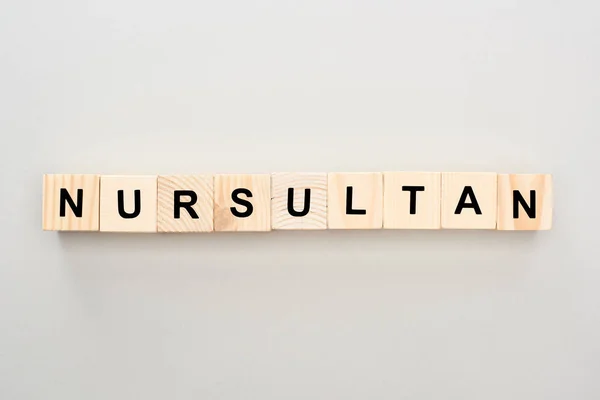 Κορυφαία Όψη Των Ξύλινων Μπλοκ Γράμματα Nursultan Λευκό Φόντο — Φωτογραφία Αρχείου