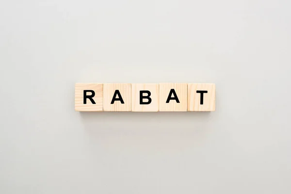 Top View Wooden Blocks Rabat Lettering White Background — Stock Photo, Image
