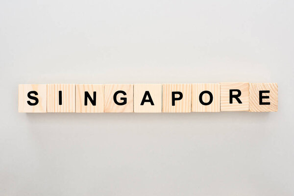 top view of wooden blocks with Singapore lettering on white background