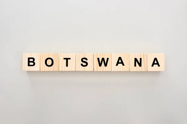 Bovenaanzicht Van Houten Blokken Met Botswana Belettering Witte Achtergrond — Stockfoto