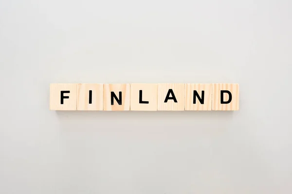 Top Uitzicht Van Houten Blokken Met Finland Belettering Witte Achtergrond — Stockfoto