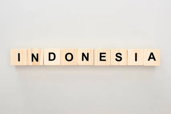 Widok Góry Drewniane Bloki Indonezji Napis Białym Tle — Zdjęcie stockowe