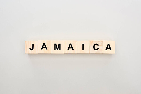 top view of wooden blocks with Jamaica lettering on white background