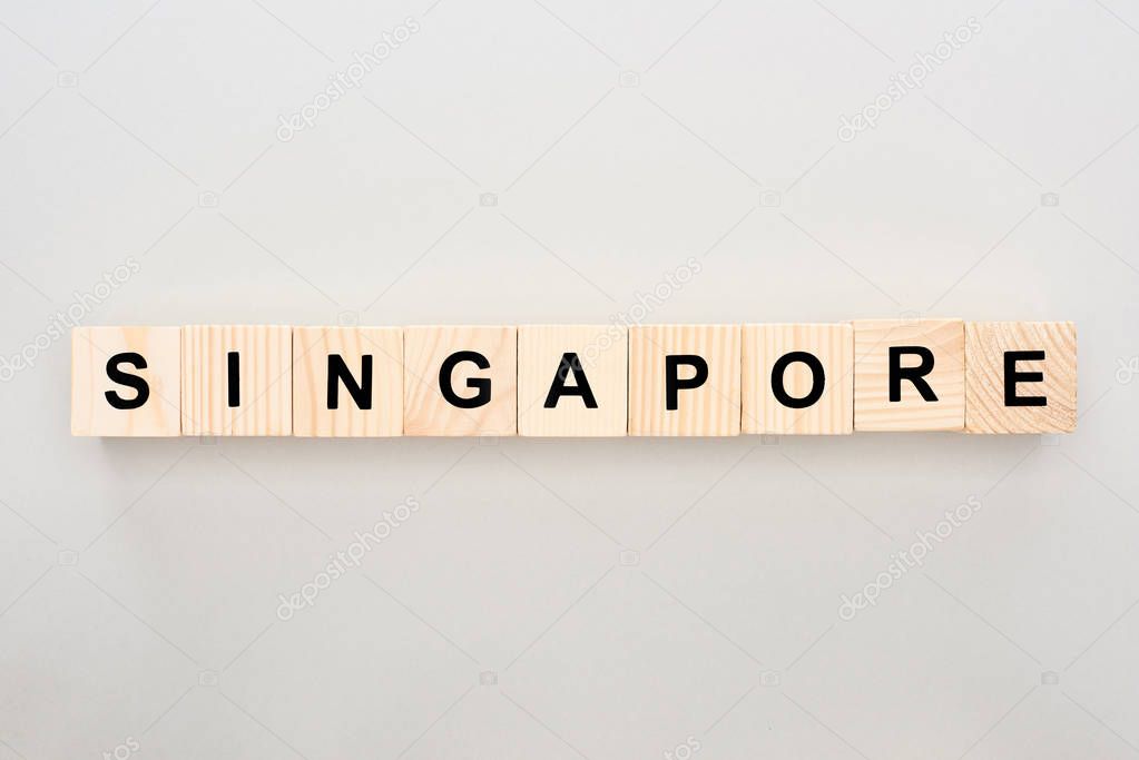 top view of wooden blocks with Singapore lettering on white background